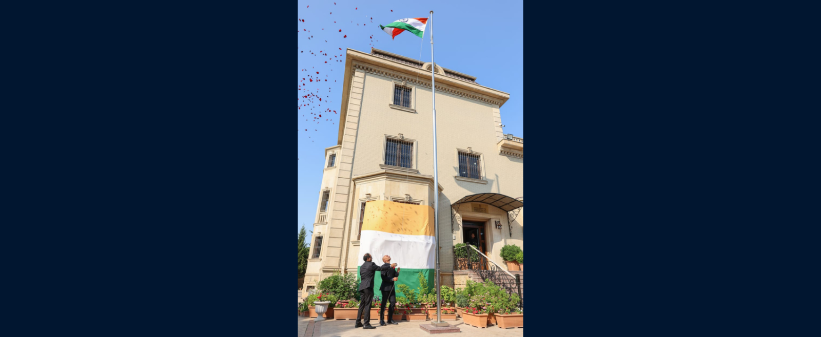 Ambassador hoisitng the Indian National Flag on Independence Day